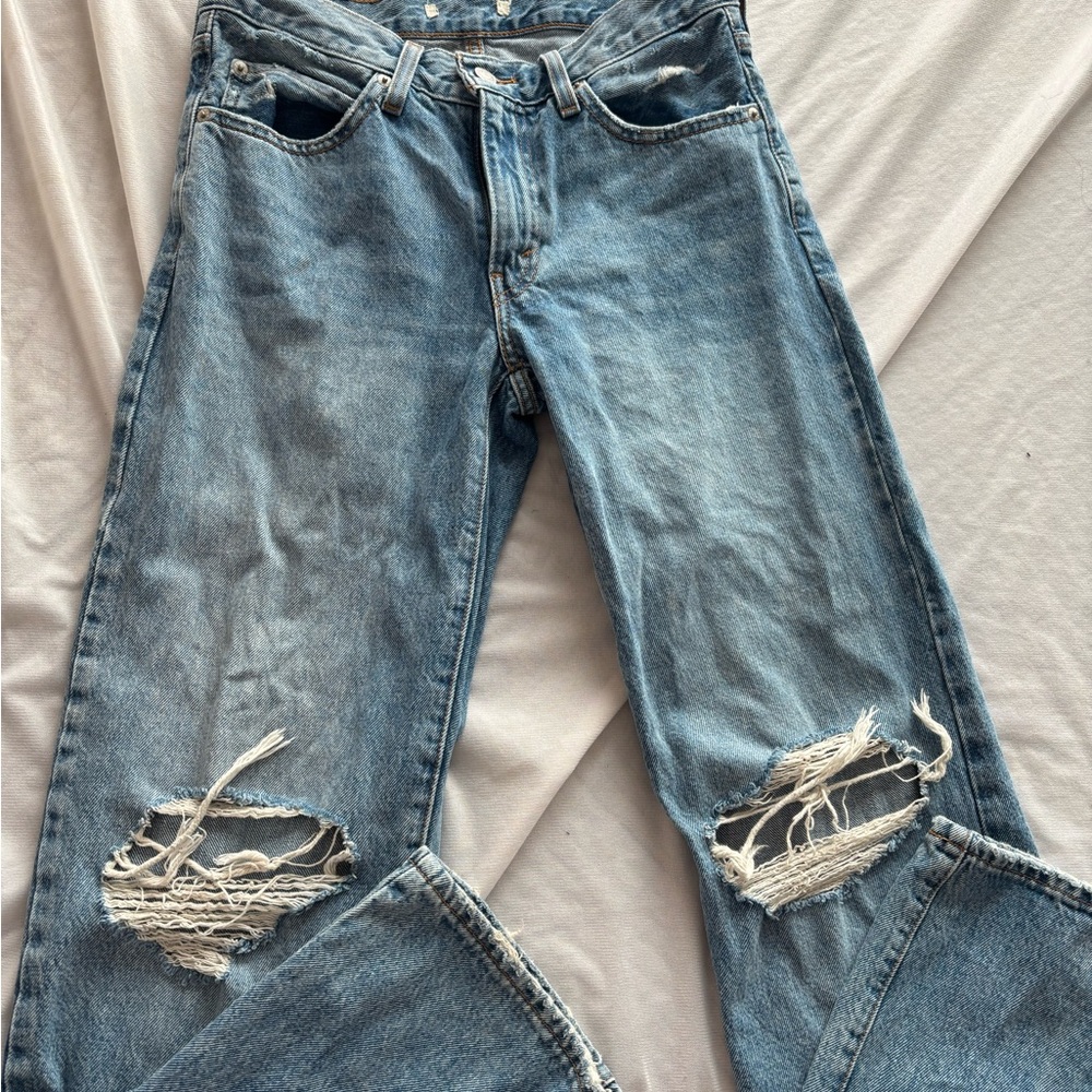 Distressed Blue Jeans